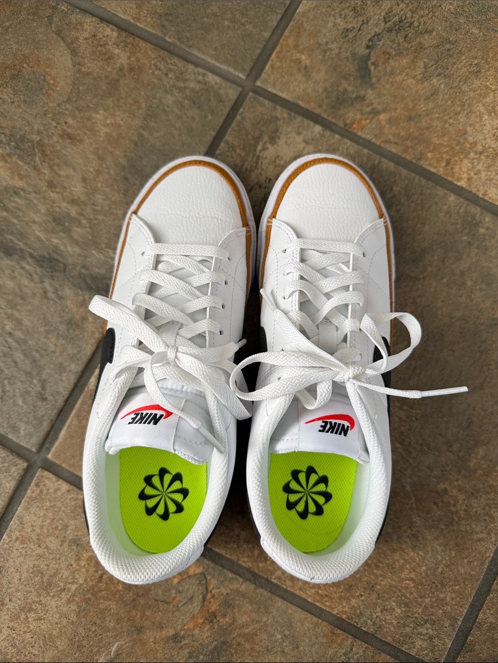 Nike Women’s White and Black Low-Top Sneakers with Gum Trim